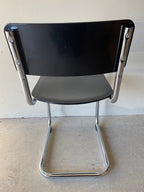 Chaise de salle à manger incurvée d'inspiration rétro en noir - SECONDS