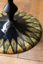 Table d'appoint d'inspiration Art déco noire et dorée
