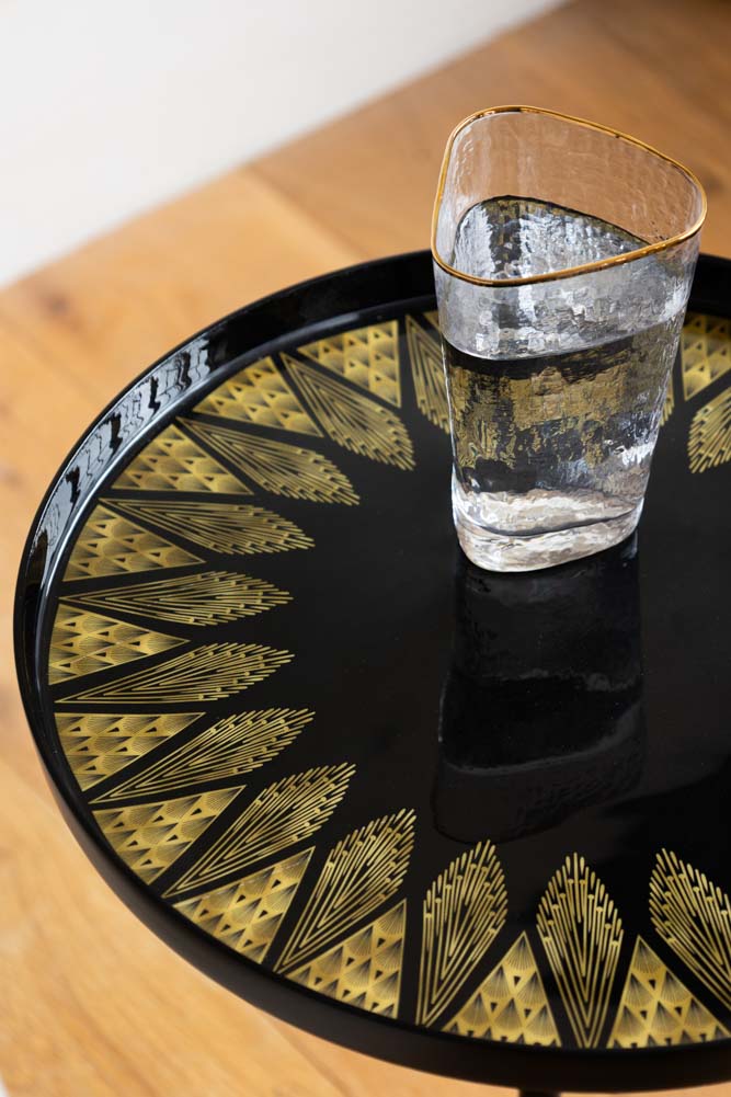 Table d'appoint d'inspiration Art déco noire et dorée