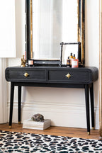 Console Ringo noire et dorée