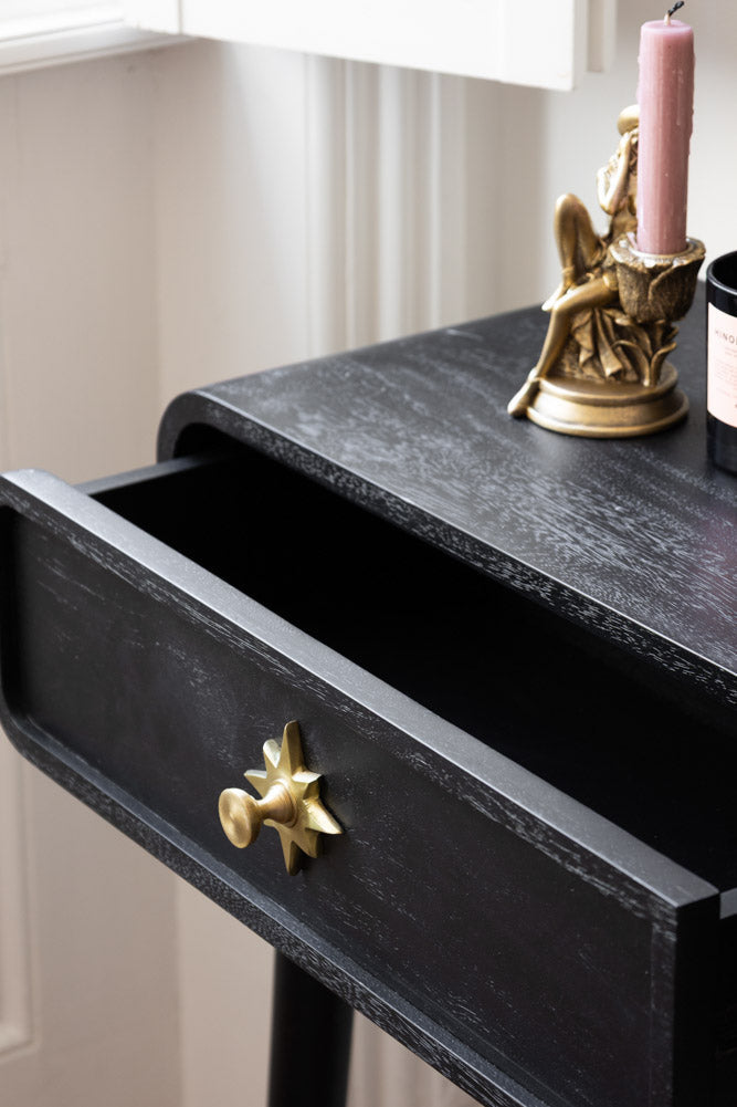 Console Ringo noire et dorée