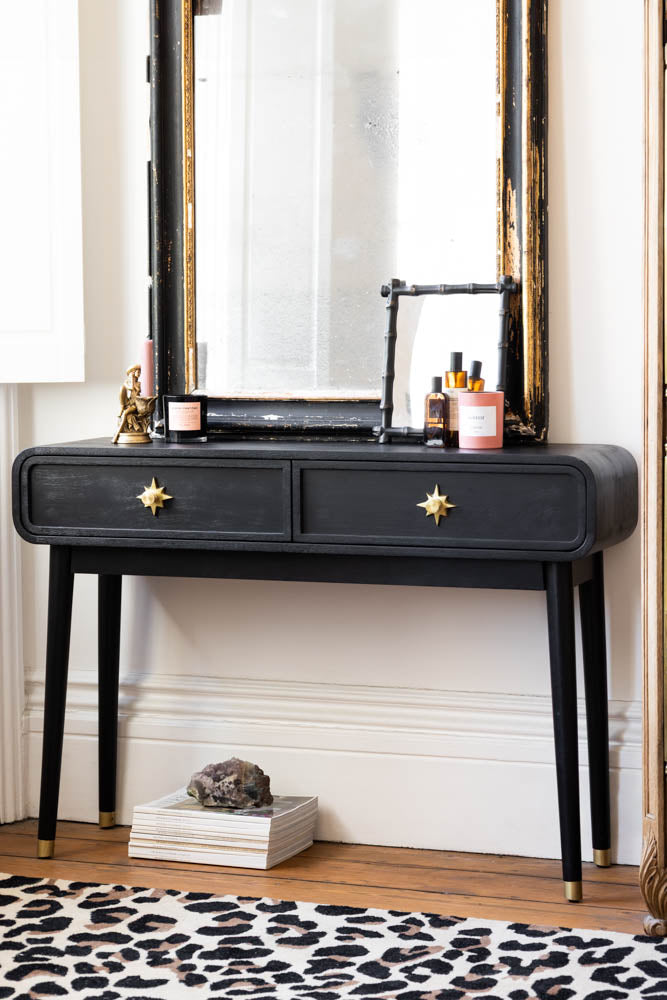 Console Ringo noire et dorée