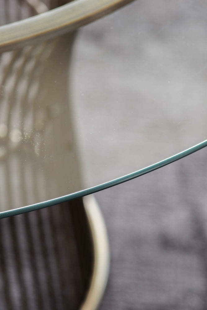 Table à manger ronde en bronze et verre
