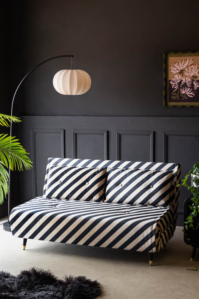 Grand canapé-lit 2 places Mabel en velours Studio Stripe sable et noir
