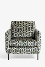 Le fauteuil en velours imprimé marguerites Edie