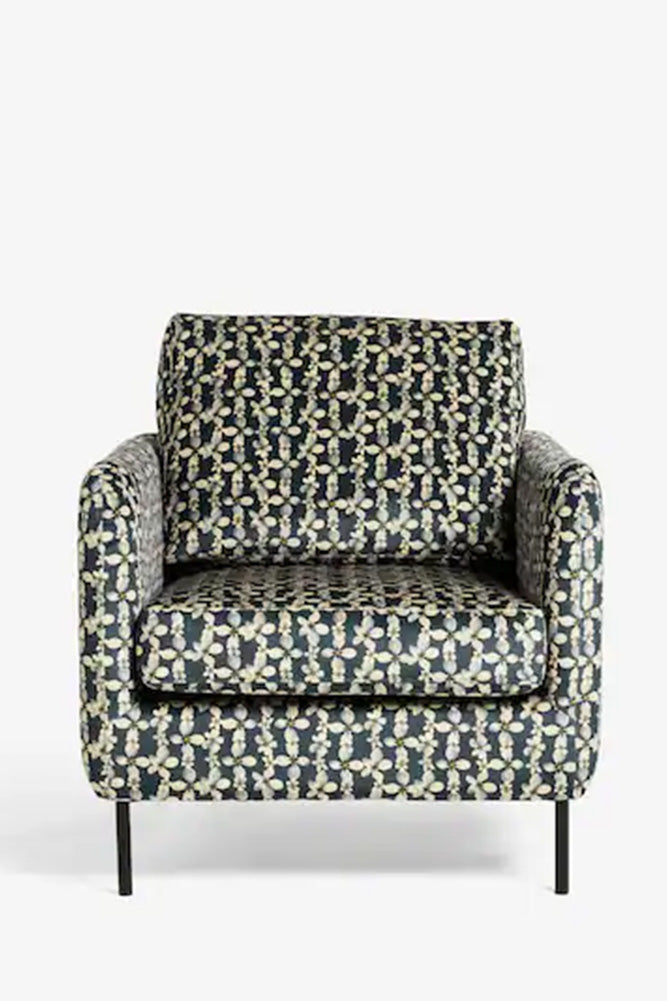 Le fauteuil en velours imprimé marguerites Edie