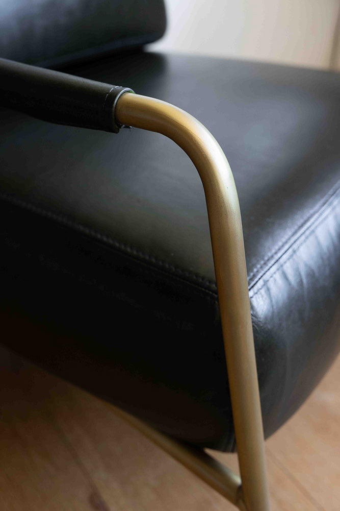 Fauteuil club en cuir vert foncé