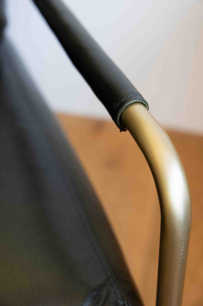 Fauteuil club en cuir vert foncé