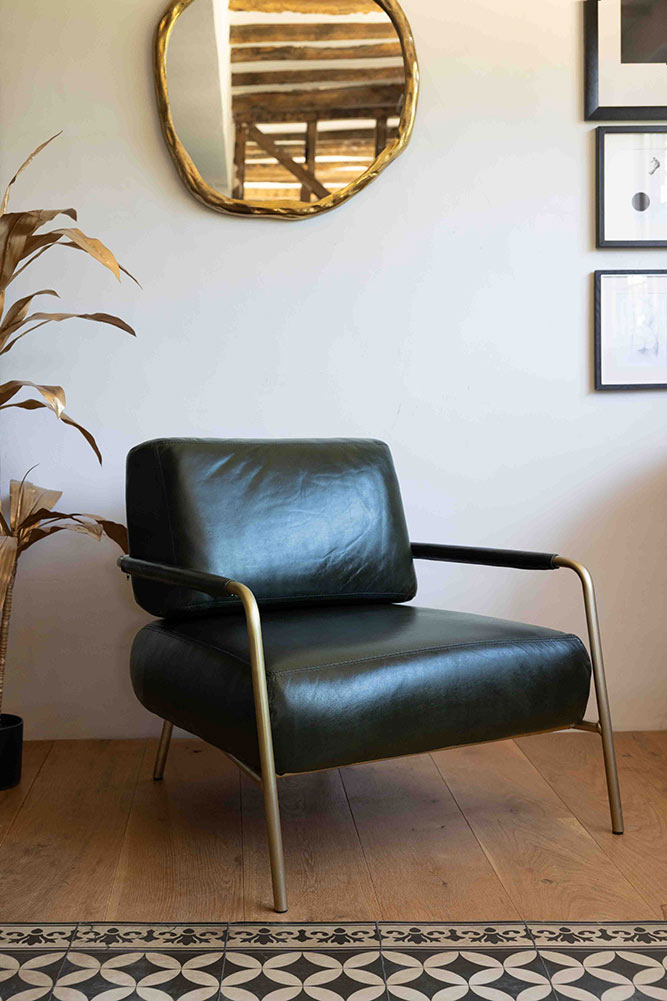 Fauteuil club en cuir vert foncé